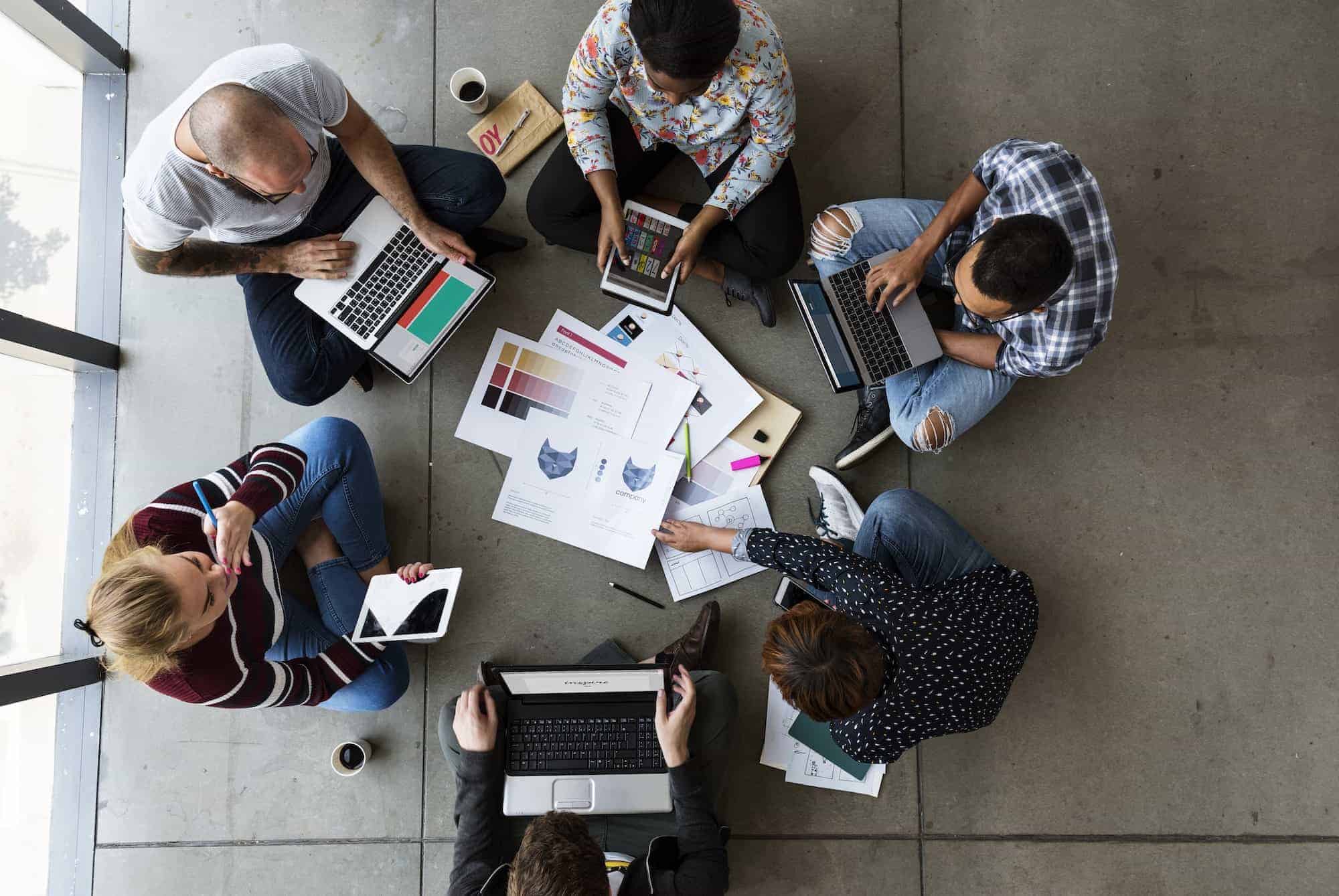 group-of-people-brainstorming-sitting-on-the-floor.jpg